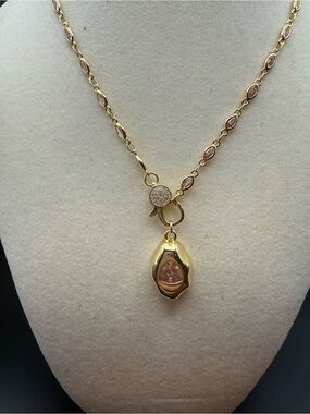Gold-Tone Necklace with Pink Crystal Accents and pink and gold charm